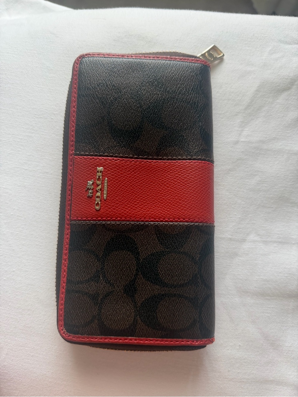 Coach Gold-Tone Keychain with Red Accent